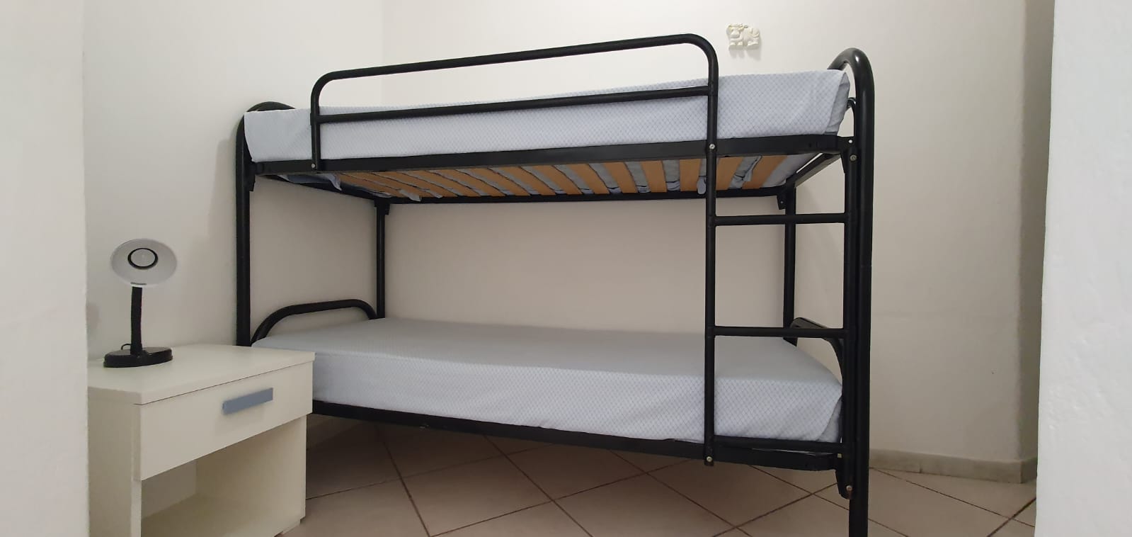 app.15 altra stanza con letto a castello (di passaggio per andare in bagno)